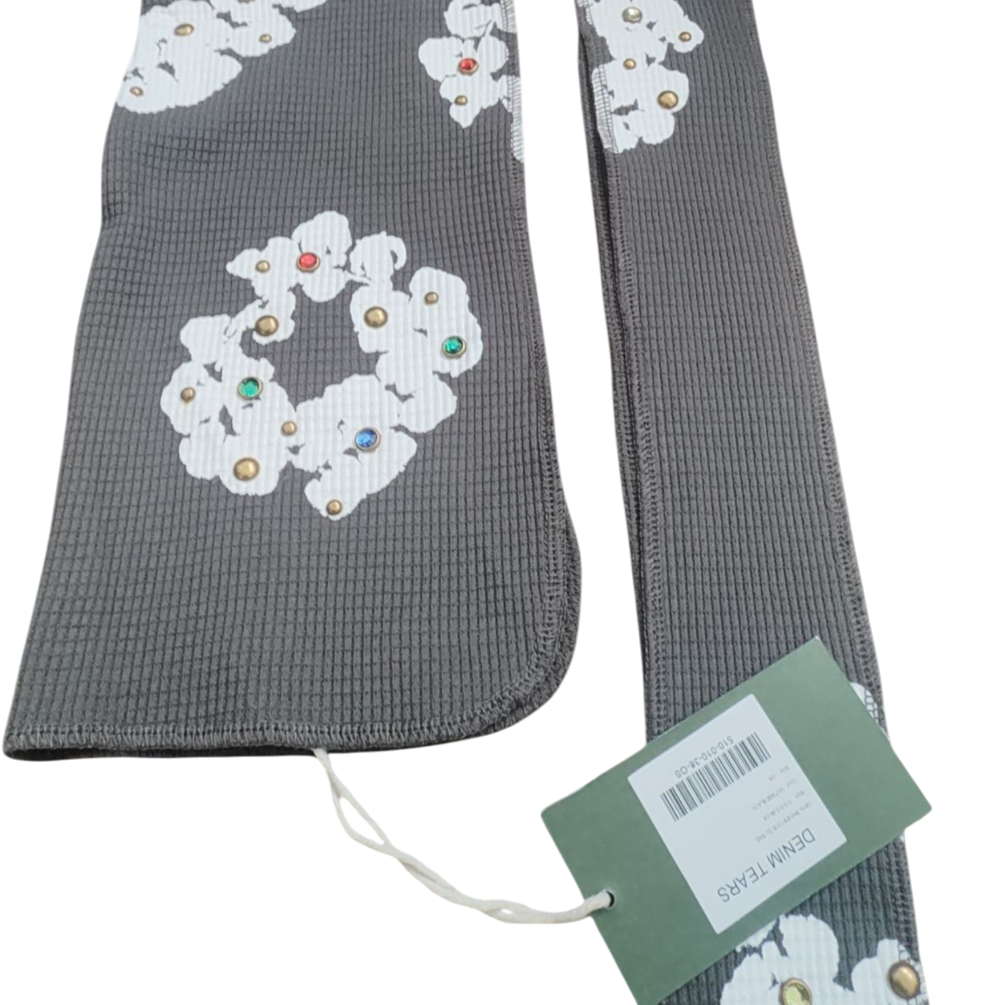 Gray textured scarf with white floral embroidery and colorful beads, displayed with a tag.