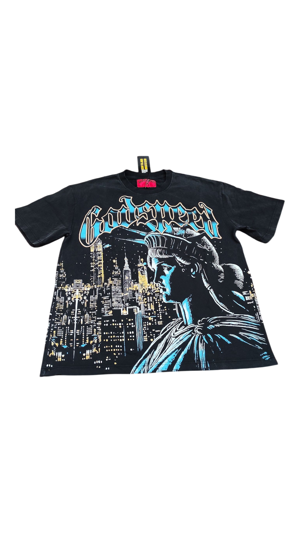 Black t-shirt with graphic design of a cityscape and a person holding a light, on a white background.